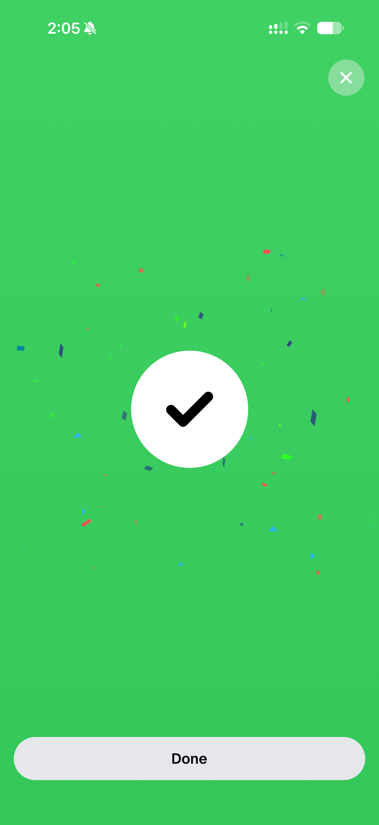 The Rezrv app’s booking confirmed screen: a tick in a white circle, with confetti around it